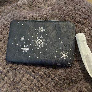 Brand new, never used Coach wristlet